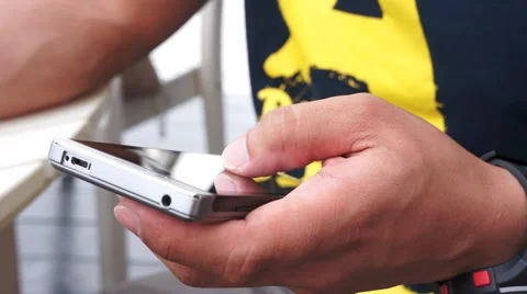 Close up of a man using mobile smart phone Stock Footage 48444476