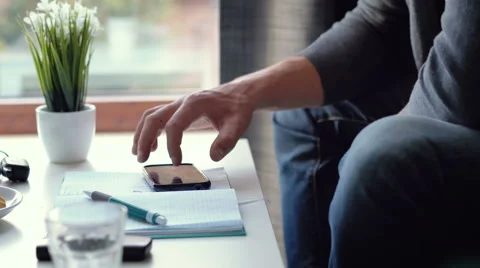 Close up of a man using mobile smart phone Stock Footage 63876732