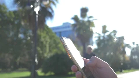Close up of a man using a mobile smart phone, outdoor. Close up of a male hands Stock-Footage 83355059