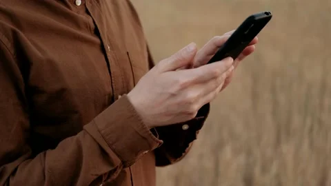 Close up of a man using mobile smart phone. Stock Footage 143776114