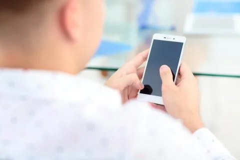 Close up of a man using mobile smart phone Foto stock