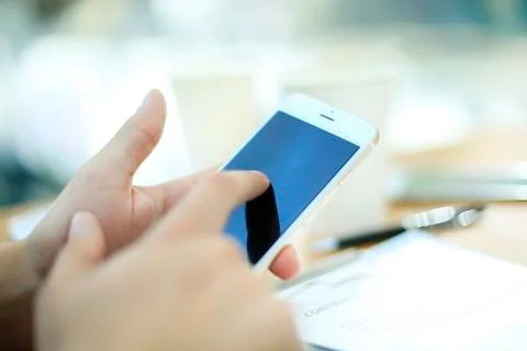 Close up of a man using mobile smart phone Stock Photos