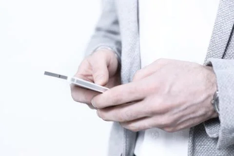 Close up of a man using mobile smart phone Stock Photos