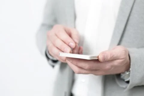 Close up of a man using mobile smart phone Stock Photos
