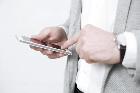 Close up of a man using mobile smart phone Stock Photos