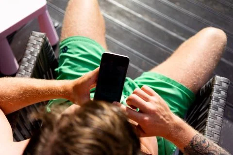 Close up of a man using mobile smart phone outdoor Stock Photos