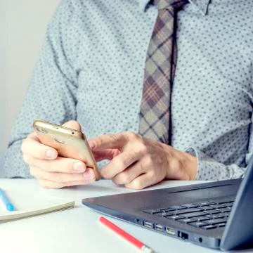 Close up of a man using mobile smart phone Stock Photos