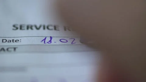 Close up man using pen writing date 18.02.2022 Stock Footage 170977868