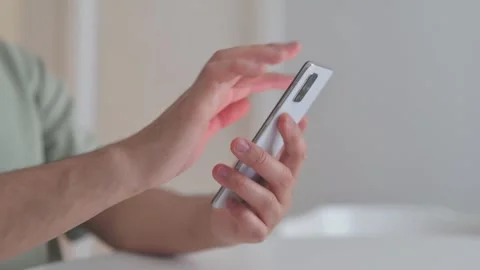 Close up of Man Using Phone 動画素材 307907091