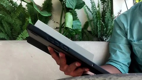Close up a man using portable device gadget 库存影片 342039592