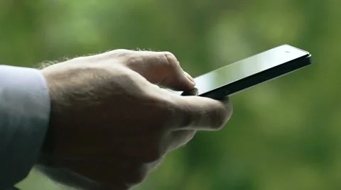 Close-Up Man Using A Smart-Phone Stock Footage 49966936