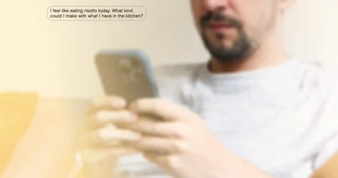 Close-up of a man using smartphone AI assistant to adjust a recipe suggesti.. Stock Footage 311119764