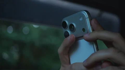 Close-up of a man using a smartphone inside a car cabin. Lifestyle, mobile... Stock Footage 341613063