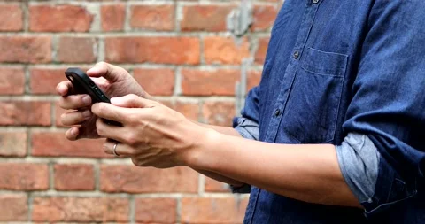 Close up of a man using a smartphone, outdoor, daytime Stock-Footage 150342060