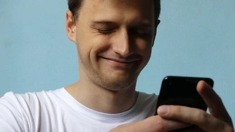 Close up of man using smartphone. Young man with tablet computer. A man at da Stock Footage 107664751