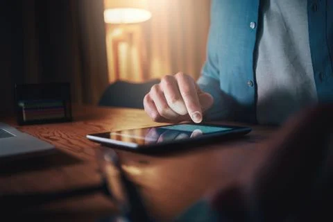 Close-up of man using social media sites on mobile phone till late Stock Photos