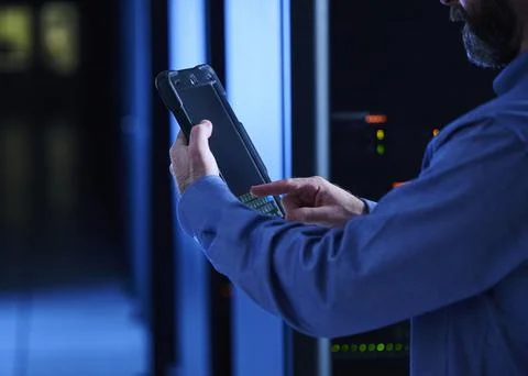 Close-up of man using tablet in data center Stock Photos