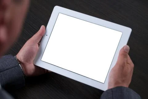 Close up of man using tablet. White screen. Stock Photos