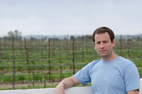 Close up of man in a vineyard. Stock Photos