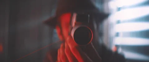 Close up of man with vintage camera in red light Stock Footage 203562531