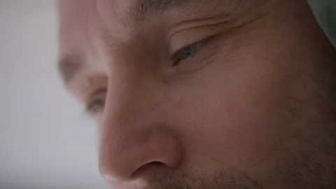 Close Up of Man Waking Up in Bed during Early Morning Stock Footage 328358102