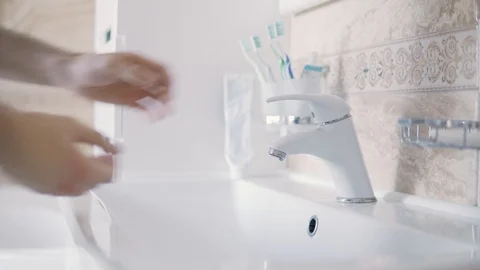 Close up man wash hands with soap in bathroom. Morning routine hygiene Stock-Footage 126719644