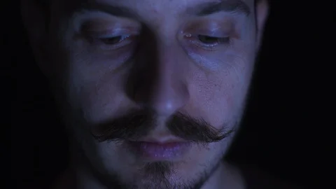 Close up of a man watching on computer Stock Footage 99749190