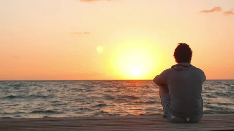 Close up of a Man Watching a Dawn at the End of the Day Stock Footage 75070507