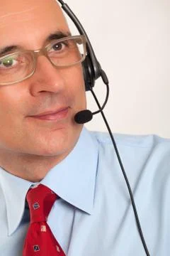 Close up of a man wearing a headset Stock Photos