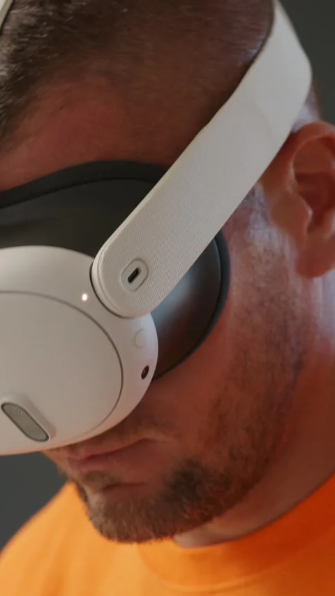 Close-up of man wearing VR goggles or augmented reality headset. Stock Footage 267876087