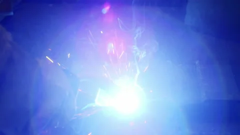 Close-up, A man welds plates for body armor from springs. homemade armor plate Stock Footage 178804622