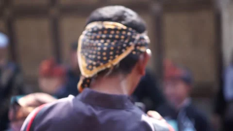 Close up man from West Java wearing traditional clothes at his head. Stock Footage 249922848