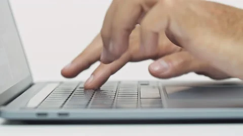 Close-up of the man which prints something on the laptop. Stock Footage 163355956