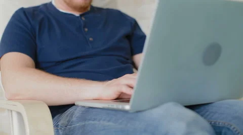 Close-up of the man which works behind the laptop. Stock Footage 62519168