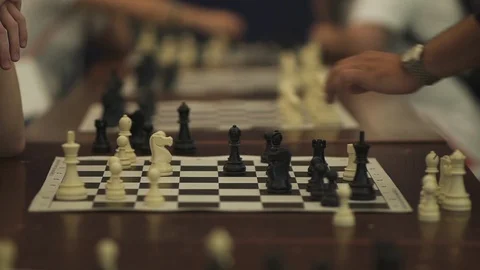 Close-up of man who is making move in chess game. Hand of chess player playing Video stock 119898252