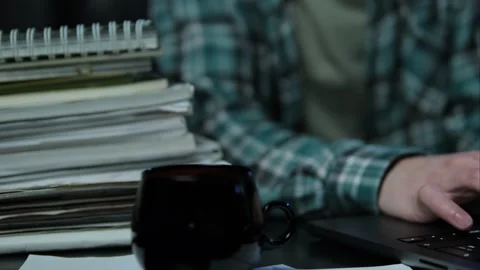 Close up a man working on computer, using touchpad, typing corporate message, co Stock Footage 297187976