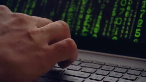 Close up of man working on his laptop with falling letters animation Stock Footage 87386441