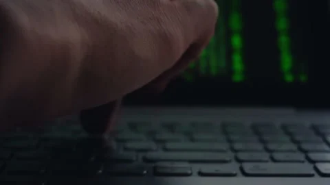 Close up of man working on his laptop with falling letters animation Stock Footage 87386711