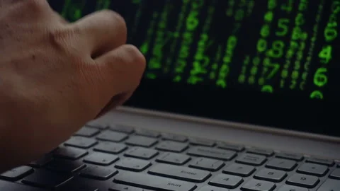 Close up of man working on his laptop with falling letters animation Stock Footage 87782622