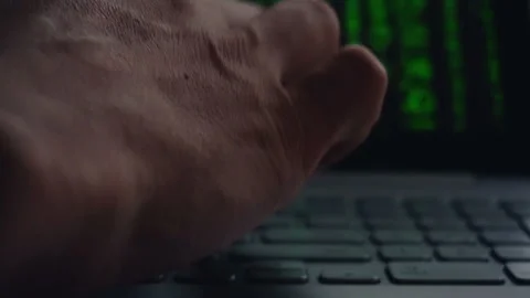 Close up of man working on his laptop with falling letters animation Stock Footage 87782739