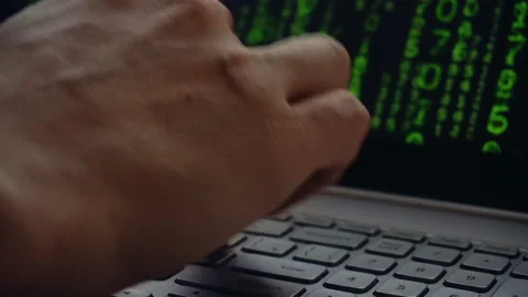 Close up of man working on his laptop with falling letters animation Stock Footage 87875132