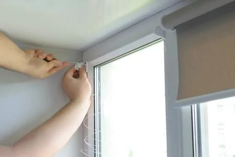 Close up man working, installing plastic window with screwdriver at home, r.. Stock Photos