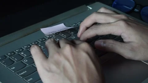 Close up man working with this laptop and get motivation sticky note with wor Stock Footage 287783014