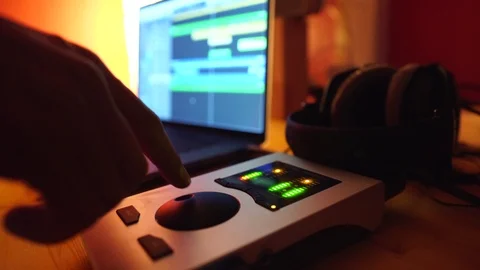 Close up of man working on professional digital audio volume mixer Stock Footage 121359545