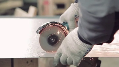 Close-up of man working with special saw and metal. Stock-Footage 77007077