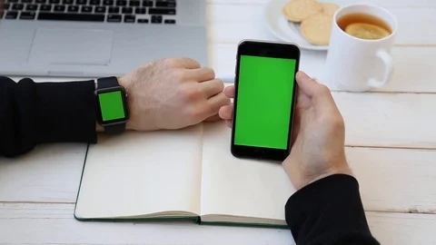 Close up of Man Working Using Smartwatch Connected to Phone. Stock Footage 116613866