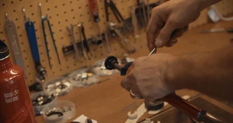 Close Up Of Man Working At Workbench 스톡 동영상 105874547