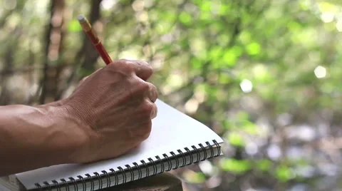 Close up man writing . Stock Footage 65813805