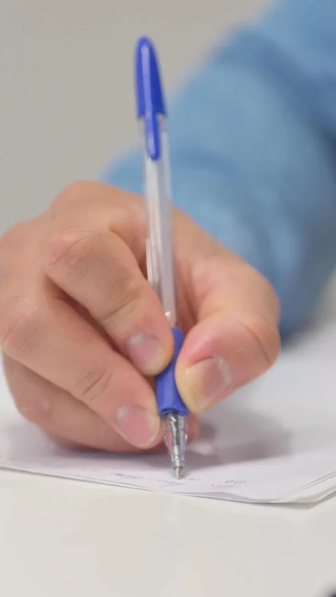 Close up of Man Writing a Letter, vertical video Stockbeeldmateriaal 325700368