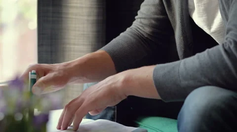 Close up of a man writing something in a notebook Stock Footage 65375519